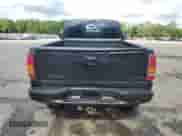 2002 Chevrolet Silverado 1500 LS with VIN 1GCEK14T72Z106860, listed as a Copart auction lot 54909765 with 301,431 mi miles and Salvage title. Bid and sale history available at DreamBid. Image 6.