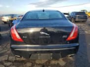 ✅ 2014 Jaguar XJ • VIN: SAJWJ1CD9E8V62758 • Lot: 81730525. Listed on Copart with 156,539 mi. Free auction sales archive from the USA and detailed vehicle history report at DreamBid. Image 6.