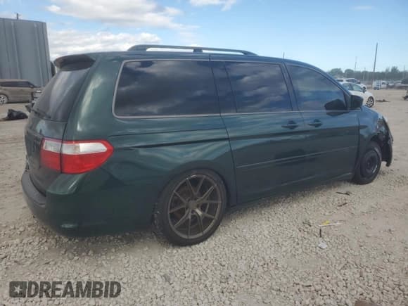 ✅ 2006 Honda Odyssey EX-L • VIN: 5FNRL38756B115706 • Lot: 82527395. Listed on Copart with 181,598 mi. Free auction sales archive from the USA and detailed vehicle history report at DreamBid. Image 3.