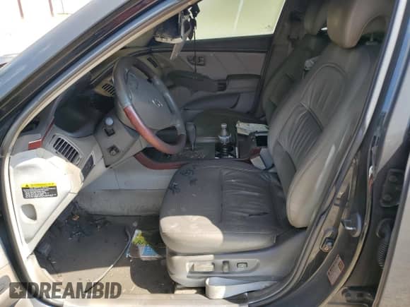 2006 Hyundai Azera SE с VIN KMHFC46F56A035393, выставлен на аукционе Copart как лот 63339195 с пробегом Не указан миль и Списание • Salvage title. История ставок и продаж доступна на DreamBid. Изображение 7.