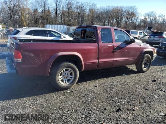 ✅ 2003 Dodge Dakota • VIN: 1D7HL12X43S207435 • Лот: 80863154. Размещён на Copart с пробегом 157 376 миль миль. Получите бесплатный доступ к архиву аукционных продаж из США и посмотрите подробный отчёт об истории автомобиля на DreamBid. Изображение 3.