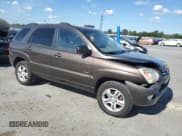 ✅ 2007 Kia Sportage EX • VIN: KNDJE723277444939 • Lot: 71031215. Listed on Copart with 188,006 mi. Free auction sales archive from the USA and detailed vehicle history report at DreamBid. Image 4.