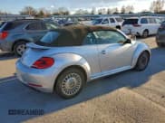 ✅ 2014 Volkswagen Beetle 1.8T • VIN: 3VW517AT4EM813931 • Lot: 94385195. Listed on Copart with Not provided. Free auction sales archive from the USA and detailed vehicle history report at DreamBid. Image 3.