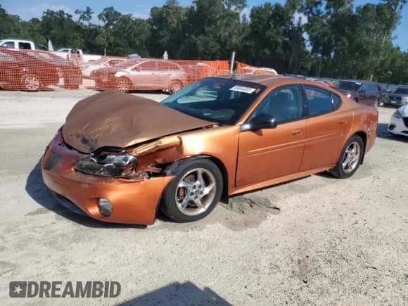 ✅ 2004 Pontiac Grand Prix GTP • VIN: 2G2WR524741134385 • Lot: 66844005. Listed on Copart with 167,819 mi. Free auction sales archive from the USA and detailed vehicle history report at DreamBid. Image 1.