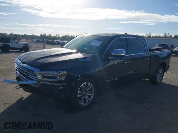 ✅ 2021 Ram 1500 Longhorn • VIN: 1C6SRFST3MN657898 • Lot: 43647983. Listed on IAAI with 206,104 mi. Free auction sales archive from the USA and detailed vehicle history report at DreamBid. Image 18.
