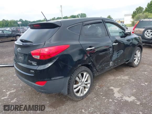 2010 Hyundai Tucson GLS with VIN KM8JUCAC0AU071627, listed as a IAAI auction lot 42617436 with 145,889 mi miles and . Bid and sale history available at DreamBid. Image 4.
