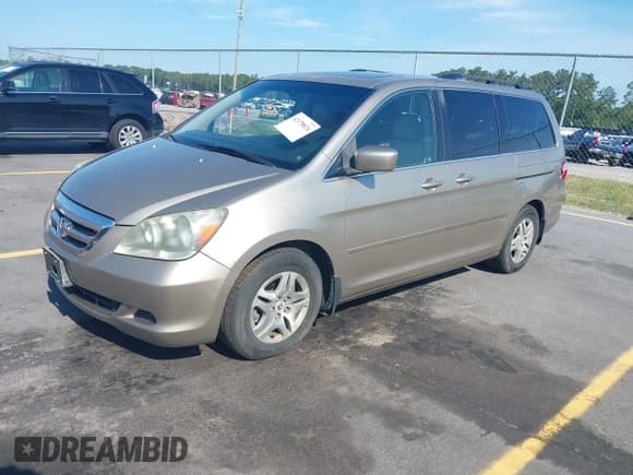 ✅ 2005 Honda Odyssey EX-L • VIN: 5FNRL38735B111376 • Lot: 42378824. Listed on IAAI with 191,632 mi. Free auction sales archive from the USA and detailed vehicle history report at DreamBid. Image 2.