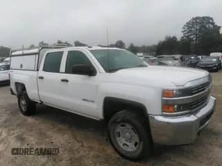 2016 Chevrolet Silverado 2500HD Work Truck z VIN 1GC1KUEG6GF129461, wystawiony jako IAAI lot #42801114 z przebiegiem 227 565 mil mil oraz . Historia ofert i sprzedaży dostępna na DreamBid. Obrazek 1.