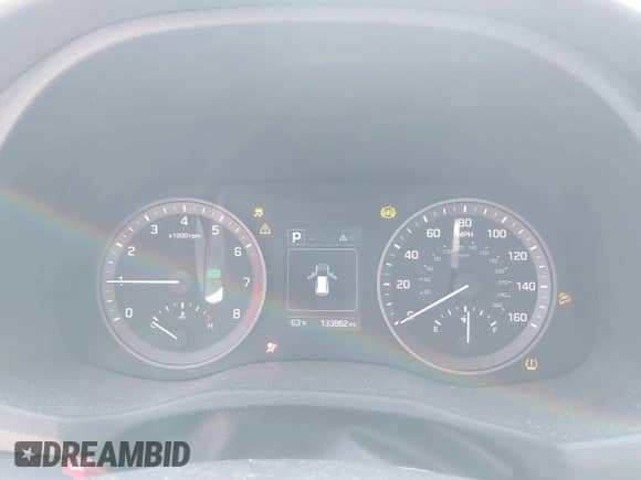 2018 Hyundai Tucson SEL z VIN KM8J33A41JU646040, wystawiony jako IAAI lot #42309676 z przebiegiem 133 862 mil mil oraz . Historia ofert i sprzedaży dostępna na DreamBid. Obrazek 7.