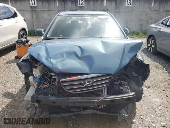 2007 Hyundai Elantra GLS z VIN KMHDU46D07U087713, wystawiony jako Copart lot #71638954 z przebiegiem 197 128 mil mil oraz Szkoda całkowita • Salvage title. Historia ofert i sprzedaży dostępna na DreamBid. Obrazek 5.