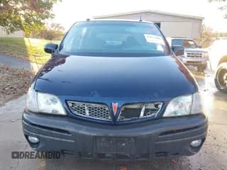 ✅ 2004 Pontiac Montana 1SA • VIN: 1GMDX03E54D231507 • Lot: 43673488. Wystawiony na IAAI z przebiegiem 284 229 mil. Bezpłatny archiwum sprzedaży aukcyjnych z USA i szczegółowy raport historii pojazdu na DreamBid. Zdjęcie 6.