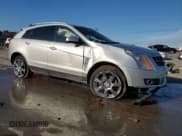 ✅ 2011 Cadillac SRX Performance Collection • VIN: 3GYFNBEY1BS659085 • Lot: 91114185. Listed on Copart with 147,391 mi. Free auction sales archive from the USA and detailed vehicle history report at DreamBid. Image 4.