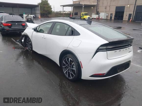 2024 Toyota Prius SE with VIN JTDACACU4R3025222, listed as a IAAI auction lot 43452192 with 5,915 mi miles and . Bid and sale history available at DreamBid. Image 3.