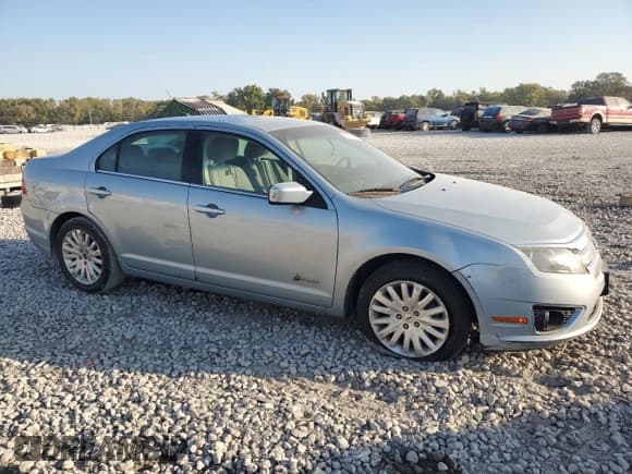 ✅ 2010 Ford Fusion Hybrid • VIN: 3FADP0L39AR108983 • Лот: 86311875. Опубликован ранее на Copart с пробегом 144 094 миль. Бесплатный доступ к архиву аукционных продаж из США и подробный отчёт об истории автомобиля на DreamBid. Изображение 4.