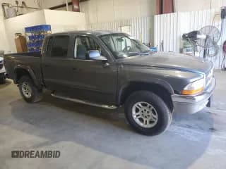 ✅ 2002 Dodge Dakota SLT • VIN: 1B7HG48N92S620875 • Lot: 86101494. Wystawiony na Copart z przebiegiem 159 436 mil. Bezpłatny archiwum sprzedaży aukcyjnych z USA i szczegółowy raport historii pojazdu na DreamBid. Zdjęcie 4.