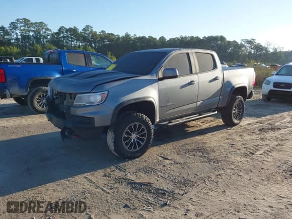 ✅ 2022 Chevrolet Colorado 4WD ZR2 • VIN: 1GCGTEEN0N1305930 • Лот: 41823662. Опубликован ранее на IAAI с пробегом 25 431 миль. Бесплатный доступ к архиву аукционных продаж из США и подробный отчёт об истории автомобиля на DreamBid. Изображение 2.
