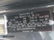 ✅ 2024 Kia Forte LXS • VIN: 3KPF24AD6RE804742 • Lot: 42804745. Listed on IAAI with 9,939 mi. Free auction sales archive from the USA and detailed vehicle history report at DreamBid. Image 9.