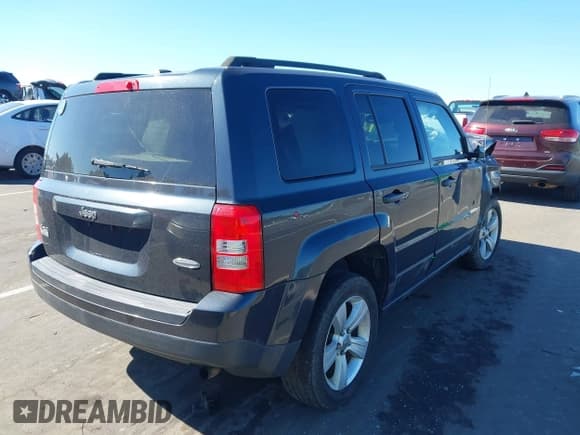 ✅ 2014 Jeep Patriot Latitude • VIN: 1C4NJRFB3ED821044 • Lot: 43503686. Listed on IAAI with 185,115 mi. Free auction sales archive from the USA and detailed vehicle history report at DreamBid. Image 4.