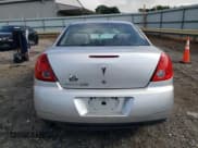 ✅ 2009 Pontiac G6 1SB • VIN: 1G2ZJ57B694272989 • Lot: 64078345. Wystawiony na Copart z przebiegiem 235 764 mil. Bezpłatny archiwum sprzedaży aukcyjnych z USA i szczegółowy raport historii pojazdu na DreamBid. Zdjęcie 6.