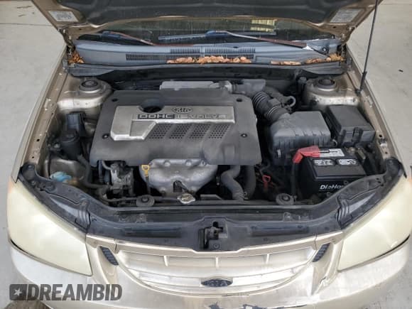 ✅ 2004 Kia Spectra LX • VIN: KNAFE121145030119 • Lot: 59522355. Listed on Copart with 86,264 mi. Free auction sales archive from the USA and detailed vehicle history report at DreamBid. Image 11.