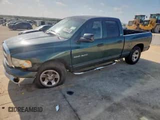 2002 Dodge 1500 with VIN 3B7HA18Z12G106142, listed as a Copart auction lot 61826335 with 221,059 mi miles and Salvage title. Bid and sale history available at DreamBid. Image 1.