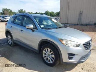✅ 2016 Mazda CX-5 Sport • VIN: JM3KE2BY0G0816281 • Lot: 43349897. Wystawiony na IAAI z przebiegiem 73 030 mil. Bezpłatny archiwum sprzedaży aukcyjnych z USA i szczegółowy raport historii pojazdu na DreamBid. Zdjęcie 1.