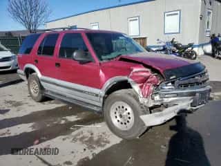 1995 Chevrolet Blazer z VIN 1GNDT13W0S2245670, wystawiony jako Copart lot #79855374 z przebiegiem 144 220 mil mil oraz Szkoda całkowita • Salvage title. Historia ofert i sprzedaży dostępna na DreamBid. Obrazek 4.