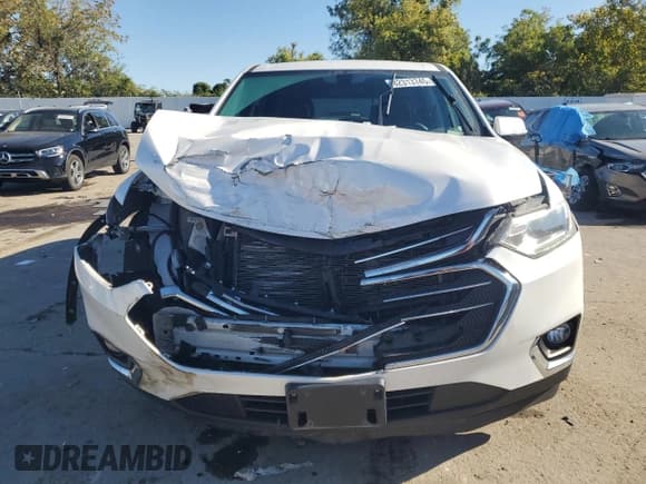 ✅ 2018 Chevrolet Traverse LT Cloth • VIN: 1GNERGKW5JJ278871 • Lot: 82313745. Listed on Copart with 123,264 mi. Free auction sales archive from the USA and detailed vehicle history report at DreamBid. Image 5.