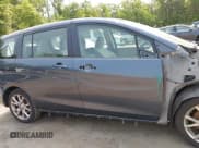 ✅ 2012 Mazda 5 Touring • VIN: JM1CW2CL5C0126744 • Lot: 42385667. Listed on IAAI with 140,150 mi. Free auction sales archive from the USA and detailed vehicle history report at DreamBid. Image 13.