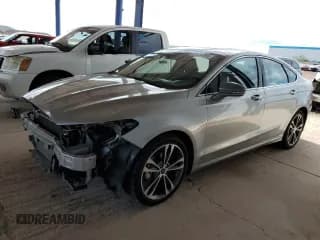 ✅ 2020 Ford Fusion Titanium • VIN: 3FA6P0D98LR152679 • Lot: 81772385. Listed on Copart with 113,060 mi. Free auction sales archive from the USA and detailed vehicle history report at DreamBid. Image 1.