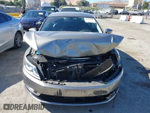 ✅ 2013 Volkswagen CC R-Line • VIN: WVWBP7AN5DE516953 • Lot: 42920630. Listed on IAAI with 107,428 mi. Free auction sales archive from the USA and detailed vehicle history report at DreamBid. Image 12.