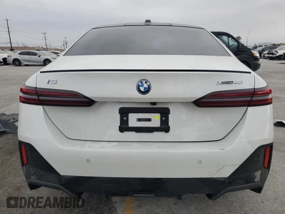 ✅ 2025 BMW i5 • VIN: WBY13HG03SCS49117 • Lot: 62116085. Listed on Copart with 1,803 mi. Free auction sales archive from the USA and detailed vehicle history report at DreamBid. Image 6.