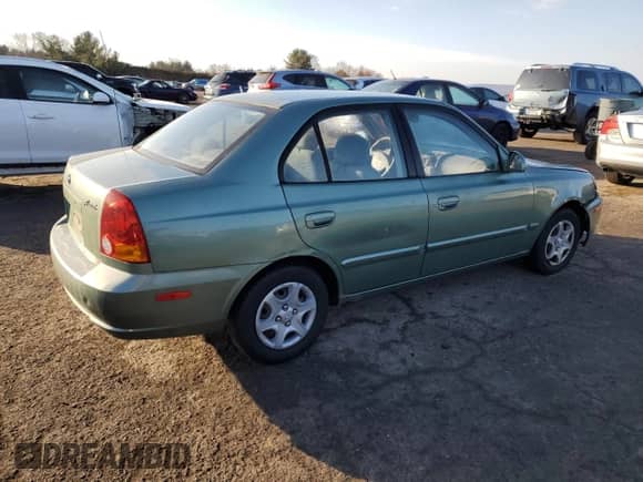 2005 Hyundai Accent GLS с VIN KMHCG45C85U588700, выставлен на аукционе Copart как лот 42792775 с пробегом 91 924 миль миль и Чистый • Clean title. История ставок и продаж доступна на DreamBid. Изображение 3.