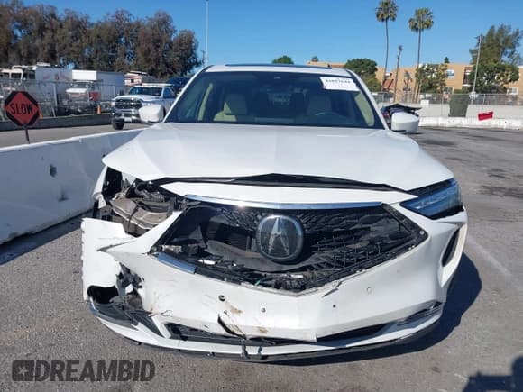 ✅ 2022 Acura MDX Technology • VIN: 5J8YD9H48NL000743 • Lot: 41817644. Listed on IAAI with 69,800 mi. Free auction sales archive from the USA and detailed vehicle history report at DreamBid. Image 13.