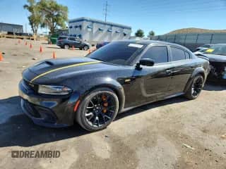2023 Dodge Charger Scat Pack with VIN 2C3CDXGJ3PH508823, listed as a Copart auction lot 67311025 with 53,871 mi miles and Salvage title. Bid and sale history available at DreamBid. Image 1.