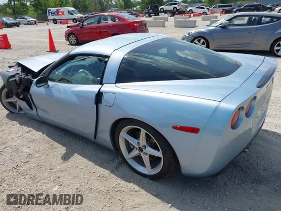 ✅ 2012 Chevrolet Corvette 1LT • VIN: 1G1YE2DW5C5102943 • Lot: 42629221. Listed on IAAI with 66,979 mi. Free auction sales archive from the USA and detailed vehicle history report at DreamBid. Image 3.