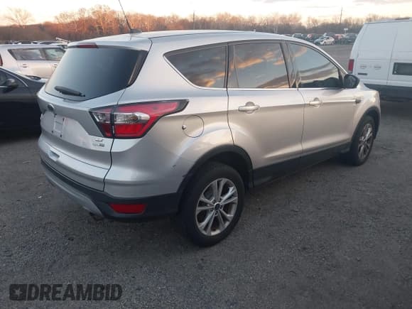 ✅ 2017 Ford Escape SE • VIN: 1FMCU9GD5HUA14443 • Lot: 43694569. Listed on IAAI with 112,952 mi. Free auction sales archive from the USA and detailed vehicle history report at DreamBid. Image 4.