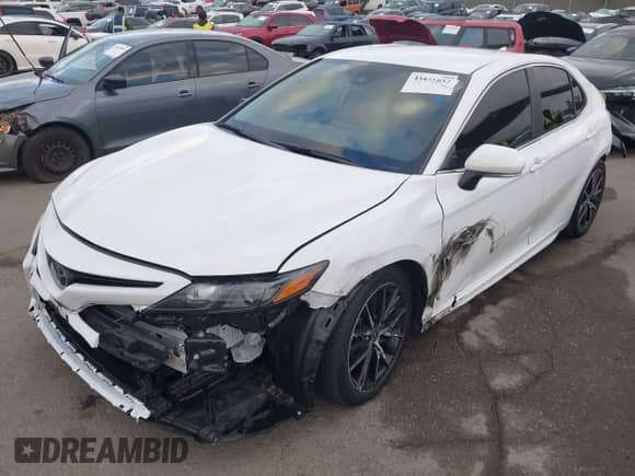 2023 Toyota Camry SE with VIN 4T1T11BK9PU081478, listed as a IAAI auction lot 43441052 with 20,259 mi miles and . Bid and sale history available at DreamBid. Image 2.