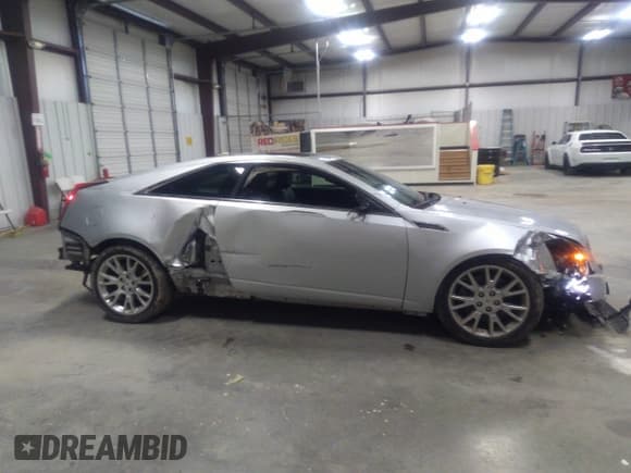 ✅ 2012 Cadillac CTS Performance • VIN: 1G6DJ1E31C0110232 • Лот: 41185119. Опубликован ранее на IAAI с пробегом 140 298 миль. Бесплатный доступ к архиву аукционных продаж из США и подробный отчёт об истории автомобиля на DreamBid. Изображение 14.