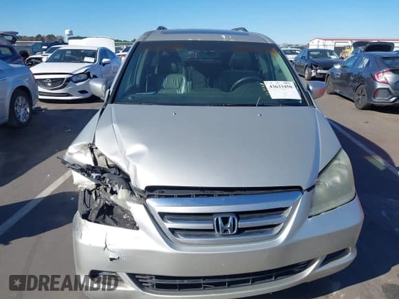 ✅ 2005 Honda Odyssey EX-L • VIN: 5FNRL38655B036820 • Lot: 43633450. Listed on IAAI with 207,568 mi. Free auction sales archive from the USA and detailed vehicle history report at DreamBid. Image 12.