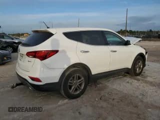 ✅ 2018 Hyundai Santa Fe 2.4L • VIN: 5NMZT3LB6JH079883 • Лот: 39017904. Опубликован ранее на Copart с пробегом 79 495 миль. Бесплатный доступ к архиву аукционных продаж из США и подробный отчёт об истории автомобиля на DreamBid. Изображение 3.