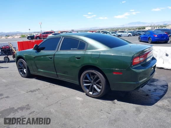 ✅ 2011 Dodge Charger • VIN: 2B3CL1CG6BH600167 • Lot: 42275659. Listed on IAAI with 256,172 mi. Free auction sales archive from the USA and detailed vehicle history report at DreamBid. Image 3.