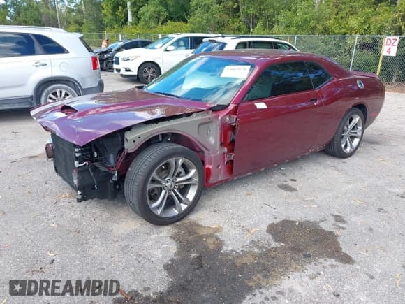 ✅ 2021 Dodge Challenger GT • VIN: 2C3CDZJG4MH668309 • Lot: 43662670. Listed on IAAI with 12,909 mi. Free auction sales archive from the USA and detailed vehicle history report at DreamBid. Image 2.