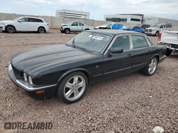 ✅ 2002 Jaguar XJ Sport • VIN: SAJDA12C82LF42173 • Лот: 68505174. Опубликован ранее на Copart с пробегом 142 675 миль. Бесплатный доступ к архиву аукционных продаж из США и подробный отчёт об истории автомобиля на DreamBid. Изображение 1.