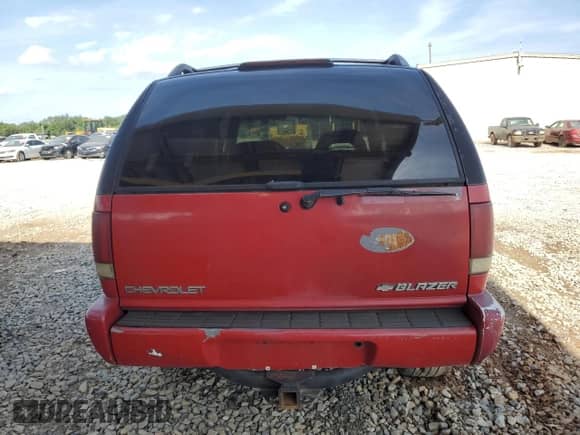 1995 Chevrolet Blazer z VIN 1GNCS13WXSK227918, wystawiony jako Copart lot #62003475 z przebiegiem 237 139 mil mil oraz Szkoda całkowita • Salvage title. Historia ofert i sprzedaży dostępna na DreamBid. Obrazek 6.