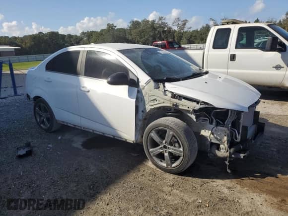 2015 Chevrolet Sonic RS с VIN 1G1JG5SB6F4184057, выставлен на аукционе Copart как лот 78735234 с пробегом 149 028 миль миль и Списание • Salvage title. История ставок и продаж доступна на DreamBid. Изображение 4.