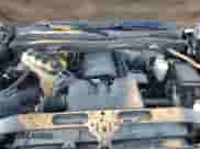 2015 Chevrolet Silverado 1500 LT z VIN 1GCRCREC4FZ262324, wystawiony jako Copart lot #84000115 z przebiegiem 129 765 mil mil oraz Szkoda całkowita • Salvage title. Historia ofert i sprzedaży dostępna na DreamBid. Obrazek 11.