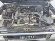 ✅ 1988 Isuzu Trooper • VIN: JAACH18E5J7822790 • Lot: 43741895. Listed on IAAI with 156,514 mi. Free auction sales archive from the USA and detailed vehicle history report at DreamBid. Image 10.