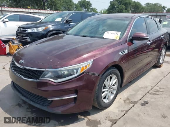 ✅ 2016 Kia Optima LX • VIN: 5XXGT4L38GG028835 • Lot: 42254044. Listed on IAAI with 246,911 mi. Free auction sales archive from the USA and detailed vehicle history report at DreamBid. Image 2.