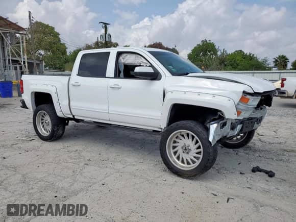 2015 Chevrolet Silverado 1500 LT с VIN 3GCUKREC0FG345035, выставлен на аукционе Copart как лот 70527485 с пробегом Не указан миль и Списание • Salvage title. История ставок и продаж доступна на DreamBid. Изображение 4.